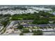 Wide aerial view showcases the property's location within a vibrant neighborhood near green spaces at 12261 Sailwinds Dr # 203, Largo, FL 33773
