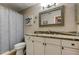 This bathroom has a shower and granite countertops at 12261 Sailwinds Dr # 203, Largo, FL 33773