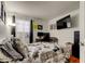 This bedroom has carpet and a desk at 12261 Sailwinds Dr # 203, Largo, FL 33773