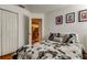 This bedroom has wood floors at 12261 Sailwinds Dr # 203, Largo, FL 33773