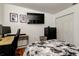 This bedroom has wood floors at 12261 Sailwinds Dr # 203, Largo, FL 33773