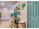 Kitchen nook featuring decorative cabinetry and a rolling kitchen island for added work surface at 12261 Sailwinds Dr # 203, Largo, FL 33773