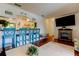 Open-concept living room and kitchen area with breakfast bar at 12261 Sailwinds Dr # 203, Largo, FL 33773