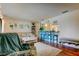 Open-concept floor plan with living room and kitchen with breakfast bar at 12261 Sailwinds Dr # 203, Largo, FL 33773