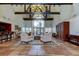 Elegant community lobby with high ceilings, chandeliers, comfortable seating, and tile flooring at 12261 Sailwinds Dr # 203, Largo, FL 33773