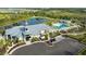 Enjoy community amenities, including a pool, clubhouse, and picturesque pond for leisure and recreation at 12586 Somatic Ct, Venice, FL 34293