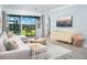Bright and airy living room with a sectional sofa, leading to an outdoor screened-in patio at 12586 Somatic Ct, Venice, FL 34293