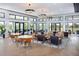 Bright and airy lounge with comfortable seating and views of the outdoors at 12586 Somatic Ct, Venice, FL 34293