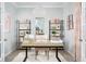 Cozy home office with a modern desk, bookshelves, and stylish decor at 12586 Somatic Ct, Venice, FL 34293