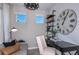 Well-lit office with modern decor, stylish desk, and comfortable seating at 13740 Rocky Pine Pl, Spring Hill, FL 34610