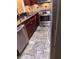 Beautiful kitchen with stainless appliances, stylish backsplash and granite countertops at 1400 Pine Glen Ln # D2, Tarpon Springs, FL 34688