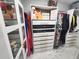 Walk-in closet with built-in shelving and ample storage for clothing and accessories at 14509 Thornfield Ct, Tampa, FL 33624