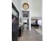 Grand foyer with high ceilings, chandelier, and dark wood floors leading into the home at 14509 Thornfield Ct, Tampa, FL 33624