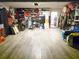 Spacious garage with epoxy floor, organized shelves, and ample storage at 14509 Thornfield Ct, Tampa, FL 33624