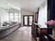 Bright living room showcasing an open floor plan and seamless transition to outdoor spaces at 14509 Thornfield Ct, Tampa, FL 33624