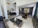 Elegant living room boasting high ceilings, stylish decor, and contemporary furniture at 14509 Thornfield Ct, Tampa, FL 33624