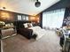 Luxurious main bedroom featuring elegant decor, and plush bedding at 14509 Thornfield Ct, Tampa, FL 33624