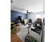 Spacious home office with 3D printer setup, ample desk space, and natural light at 14509 Thornfield Ct, Tampa, FL 33624