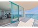 Open balcony with sliding glass doors leading to the living area, showcasing ocean views and a serene outdoor space at 1520 Gulf Blvd # 1502, Clearwater Beach, FL 33767