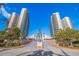 Elegant entrance to a condo complex with palm trees and beautiful landscaping at 1520 Gulf Blvd # 1502, Clearwater Beach, FL 33767