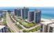 Luxury condominiums featuring tennis courts and lush landscaping, offering a resort-style living experience near the beach at 1520 Gulf Blvd # 1502, Clearwater Beach, FL 33767