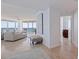Spacious living room with elegant decor, stunning ocean view from expansive windows, and seamless indoor-outdoor living at 1520 Gulf Blvd # 1502, Clearwater Beach, FL 33767