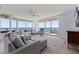 Bright living room featuring panoramic ocean views, comfortable seating, and stylish furnishings, perfect for relaxing and entertaining at 1520 Gulf Blvd # 1502, Clearwater Beach, FL 33767