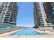 A swimming pool with lane lines in between two resort towers at 1520 Gulf Blvd # 1502, Clearwater Beach, FL 33767
