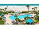An aerial view of the swimming pool area with ocean view at 1520 Gulf Blvd # 1502, Clearwater Beach, FL 33767