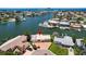 Waterfront home with boat dock and scenic views of the water and neighboring community at 17444 2Nd E St, Redington Shores, FL 33708