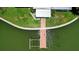 Aerial view of the back of a waterfront home with a private boat dock at 17444 2Nd E St, Redington Shores, FL 33708