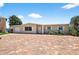 Charming single-story home with brick driveway and well-maintained landscaping at 17444 2Nd E St, Redington Shores, FL 33708