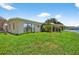 Rear exterior view of the home showing water access at 17444 2Nd E St, Redington Shores, FL 33708