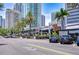 Bustling shopping district featuring dining, retail, and entertainment options amidst modern city buildings at 288 Beach Ne Dr # 12C, St Petersburg, FL 33701