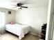 Simple bedroom design offering a blank canvas, featuring tiled floors and ample natural light at 3110 W Haya St, Tampa, FL 33614