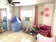 Cozy bedroom with toys and natural light, great for a ’s space at 3110 W Haya St, Tampa, FL 33614