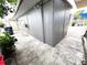 A well-maintained storage shed stands in the yard, presenting a practical outdoor solution at 3110 W Haya St, Tampa, FL 33614