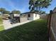 Expansive backyard complete with a spa and meticulously maintained lawn at 3120 Meadow Lake Ave, Largo, FL 33771