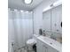 Bright bathroom featuring modern fixtures and stylish tile floor at 3120 Meadow Lake Ave, Largo, FL 33771