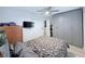 Comfortable bedroom featuring a closet and drawers for ample storage at 3120 Meadow Lake Ave, Largo, FL 33771