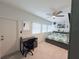 Well-lit bedroom with modern furnishings, a ceiling fan, and ample natural light at 3120 Meadow Lake Ave, Largo, FL 33771