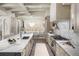 Spacious kitchen with a large marble island and modern stainless steel appliances at 324 Capri Blvd, Treasure Island, FL 33706