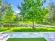 Scenic backyard with waterfront views and lush landscaping, offering a serene outdoor experience at 3409 61St E Ter, Ellenton, FL 34222