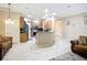Spacious open kitchen features stainless appliances, granite countertops, and wood cabinetry at 3409 61St E Ter, Ellenton, FL 34222