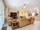 Open floor plan showing living room open to kitchen with bar seating at 3409 61St E Ter, Ellenton, FL 34222