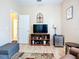 Well-lit living room with hardwood floors, a TV, and neutral colored walls at 3409 61St E Ter, Ellenton, FL 34222