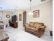 Open concept layout blending kitchen and living area with comfortable seating at 3409 61St E Ter, Ellenton, FL 34222