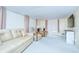 Bright and airy living room with cozy seating arrangements at 35014 Carl Ave, Zephyrhills, FL 33541