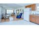 Open concept living room and kitchen layout with lots of natural light at 35014 Carl Ave, Zephyrhills, FL 33541