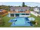 Backyard oasis with a private pool, spa, and spacious deck perfect for outdoor relaxation at 380 Colony Point S Rd, St Petersburg, FL 33705